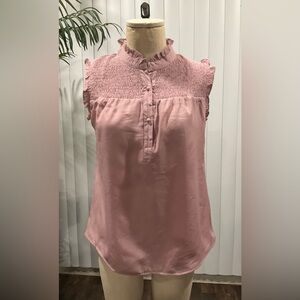 Pink sleeveless blouse